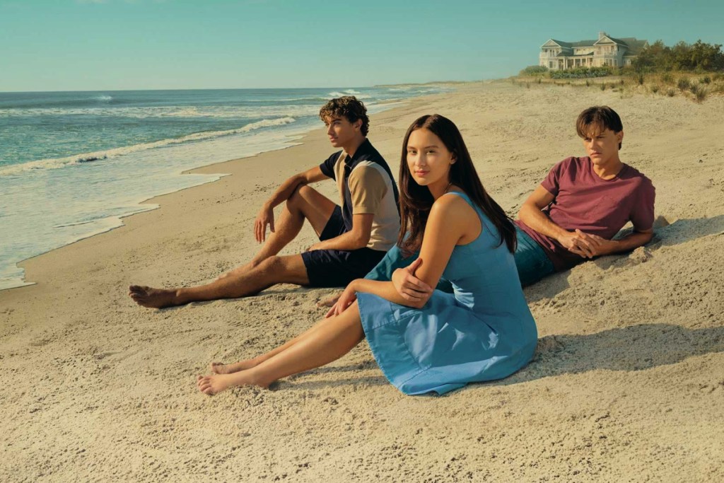 the summer I turned pretty season 2 screenshot of three people sitting on a beach