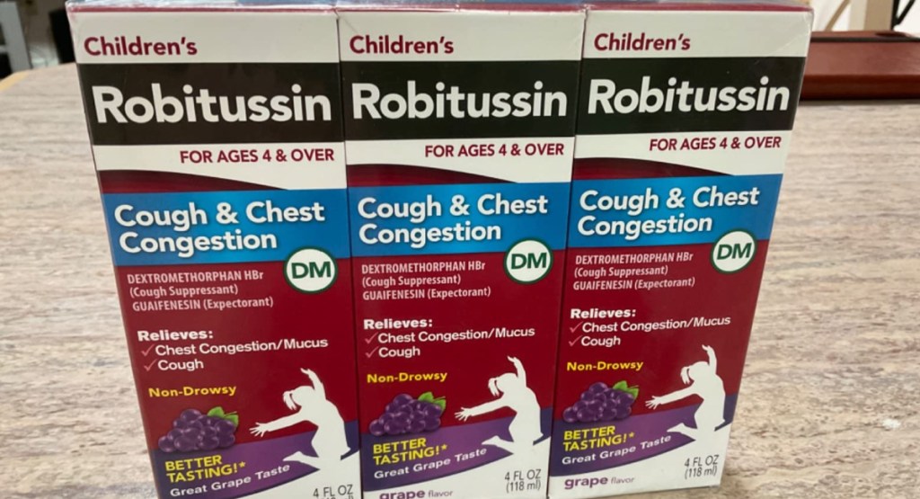 tree boxes of Robitussin childrens medicine