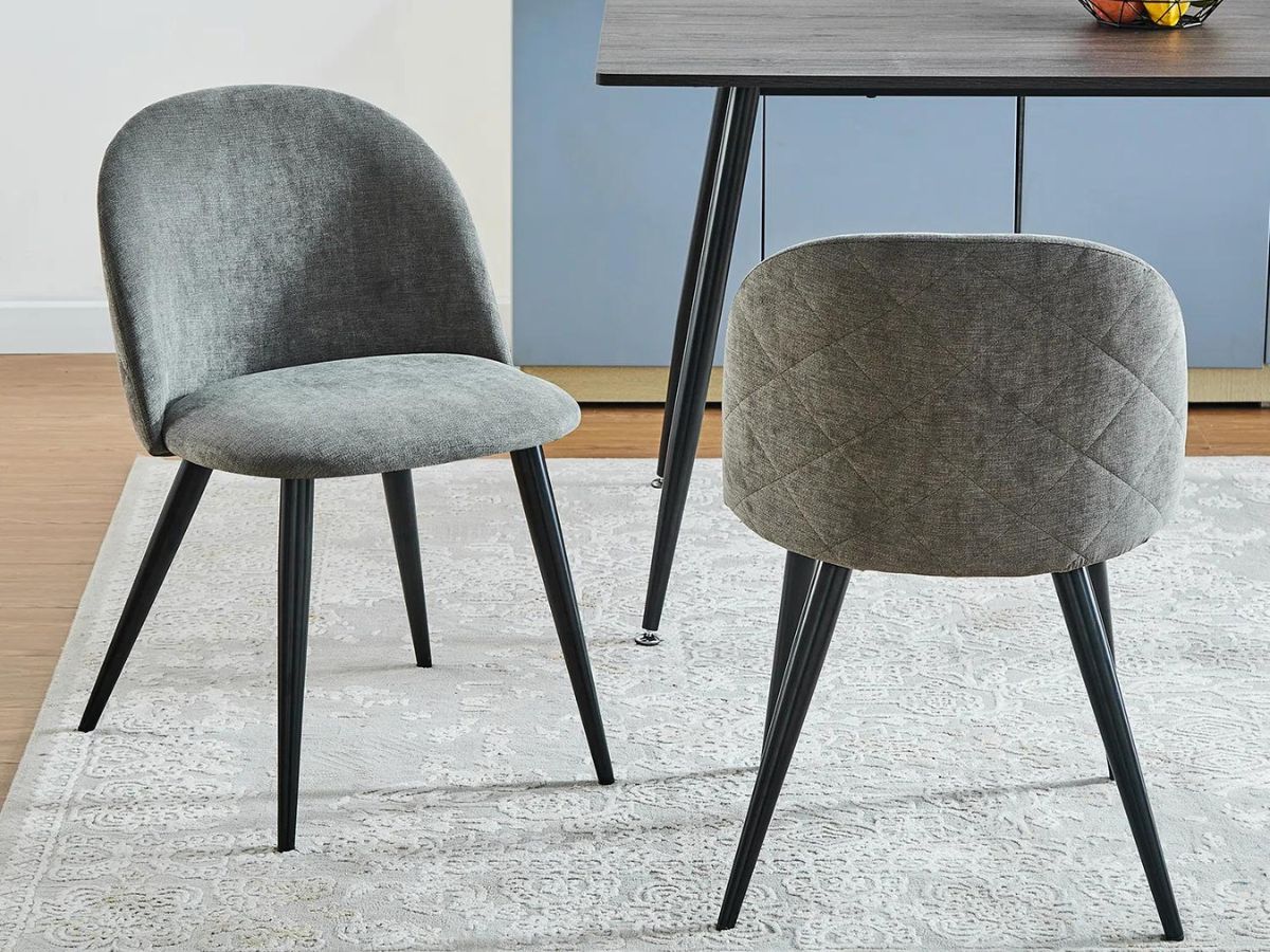 2 gray chairs in front of table