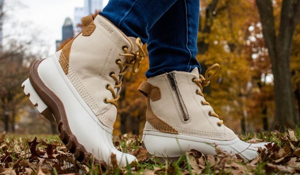 white duck boots outside in leaves