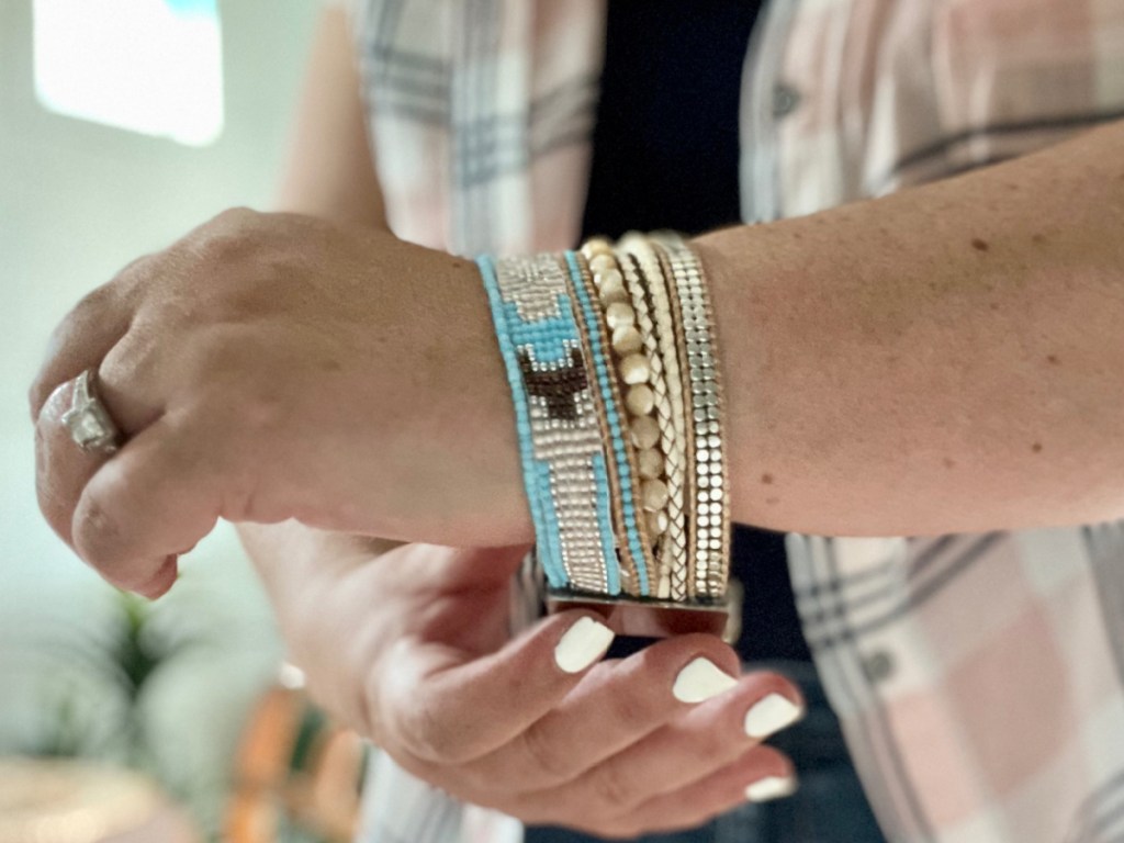 woman wearing Victoria Emerson cuff bracelet