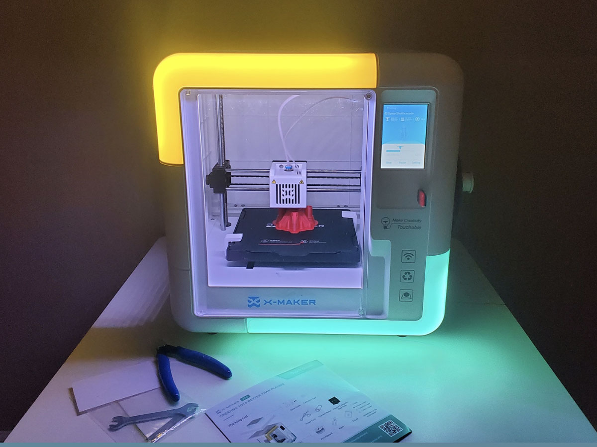 3d printer glowing while printing a rocket