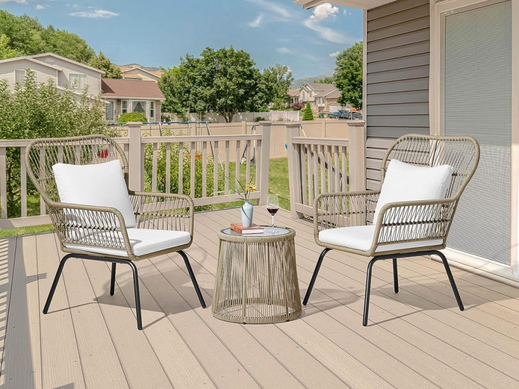 rattan bistro set on outdoor deck