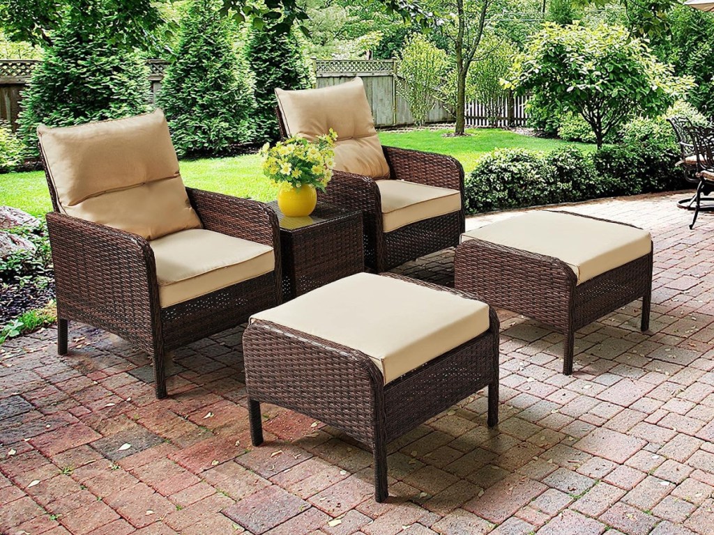 brown wicker lounge chairs and ottomans