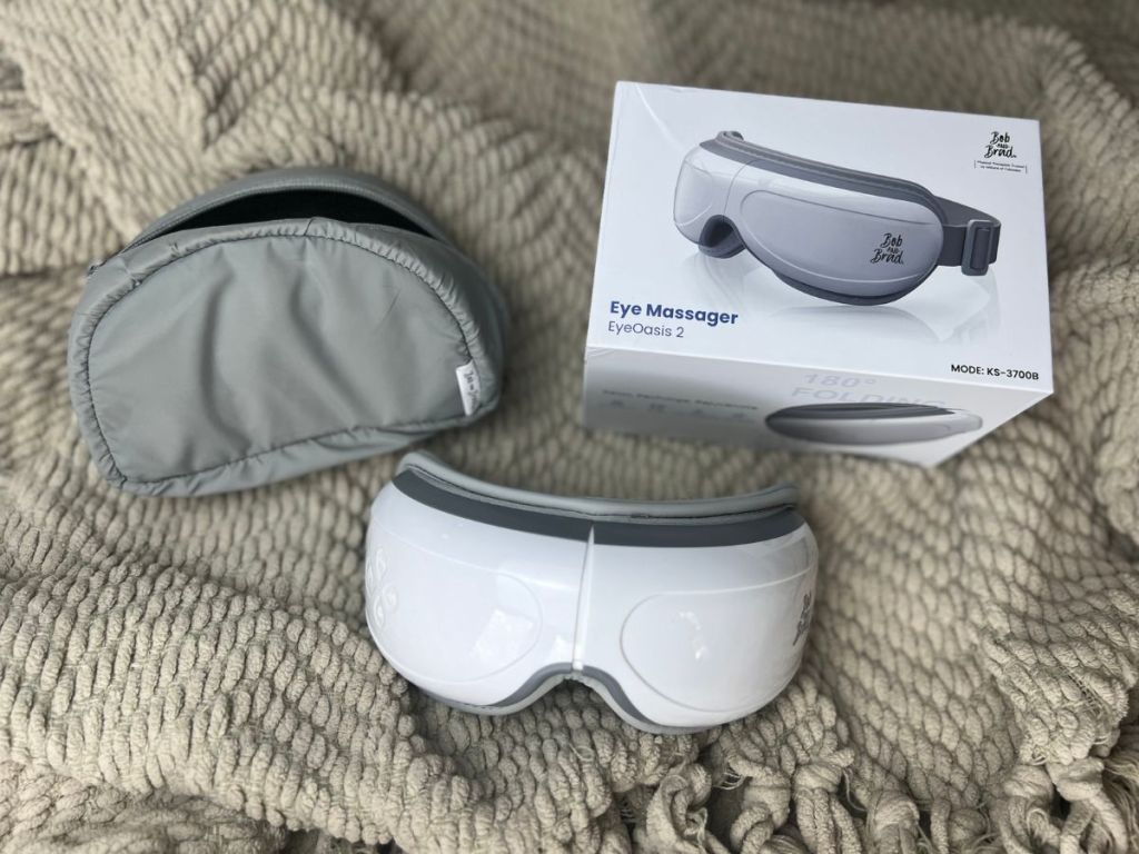 Bob & Brad EyeOasis 2 Heated Eye Mask Massager shown with carry case and box 