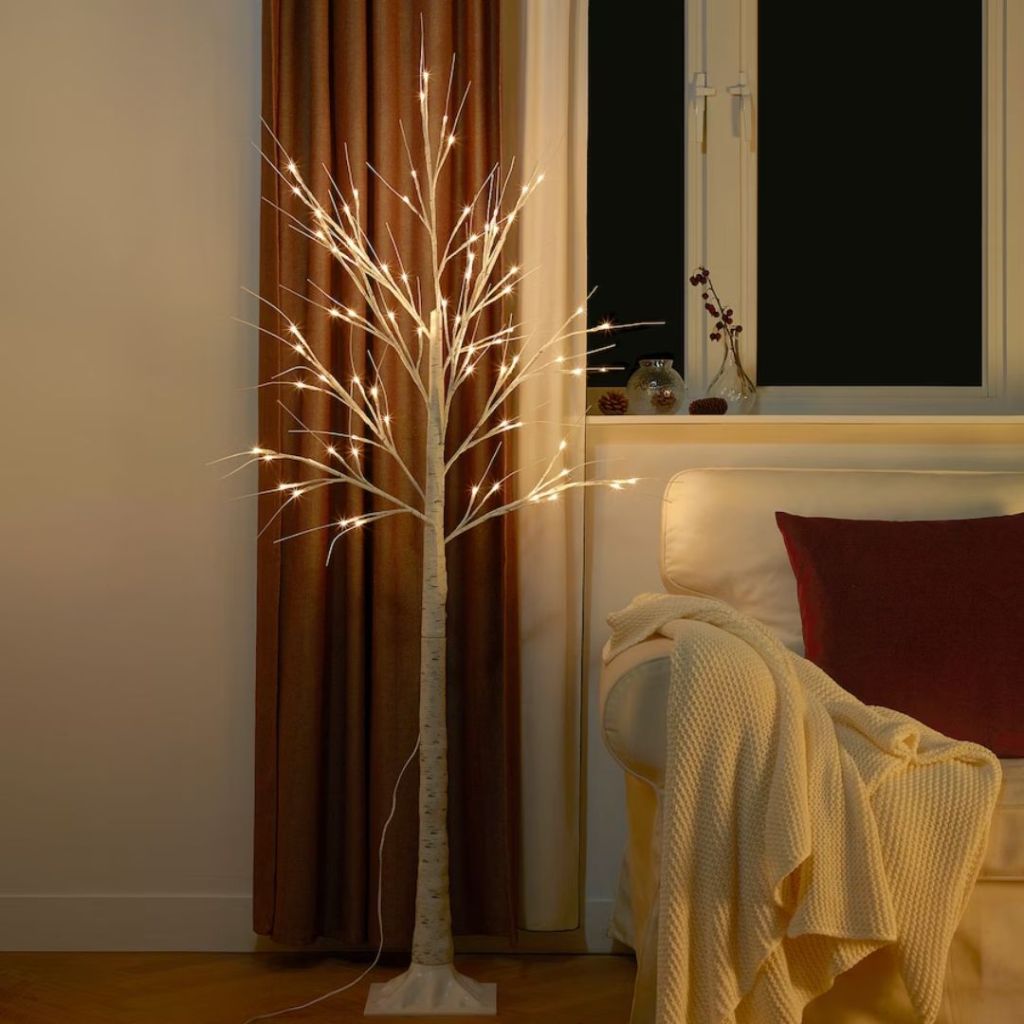 Artificial Birch Tree LED Floor Lamp lit up in living room 