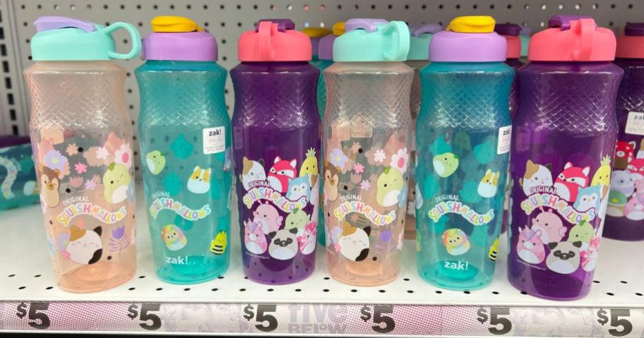 row of different color squishmallow water bottles at five below