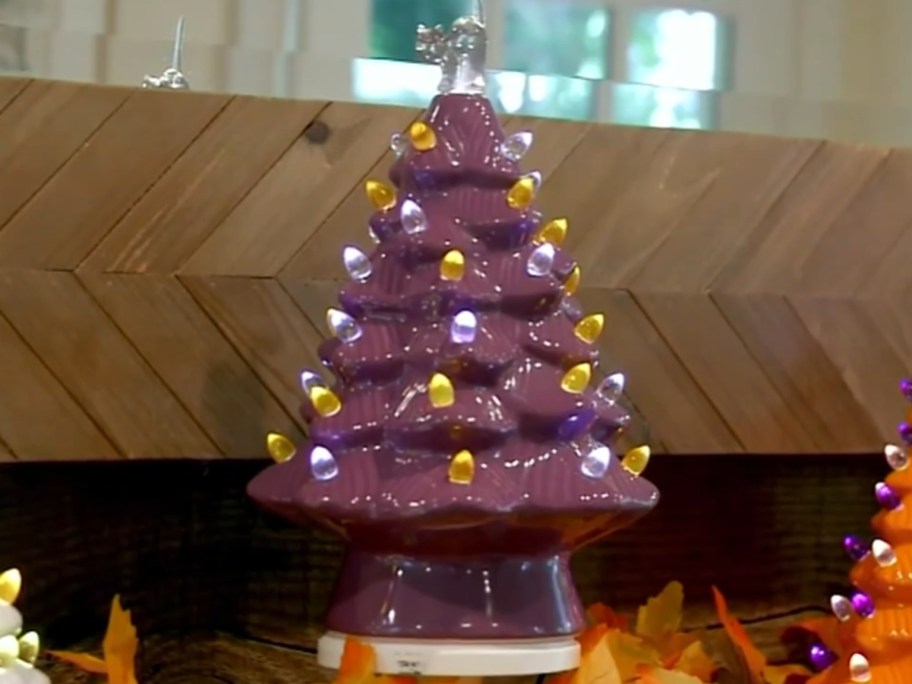 ceramic dark purple Halloween light up tree with Ghost on top