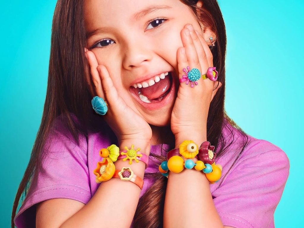 A little girl with DIY snap beads