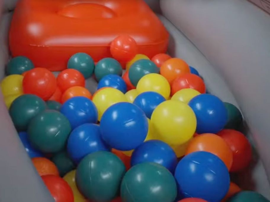 Plastic colorful ball inside a Bass Pro Inflatable Boat Ball Pit