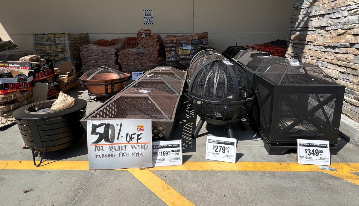 a Selection of Bulit wood burning fire pits at home depot marked 50% off