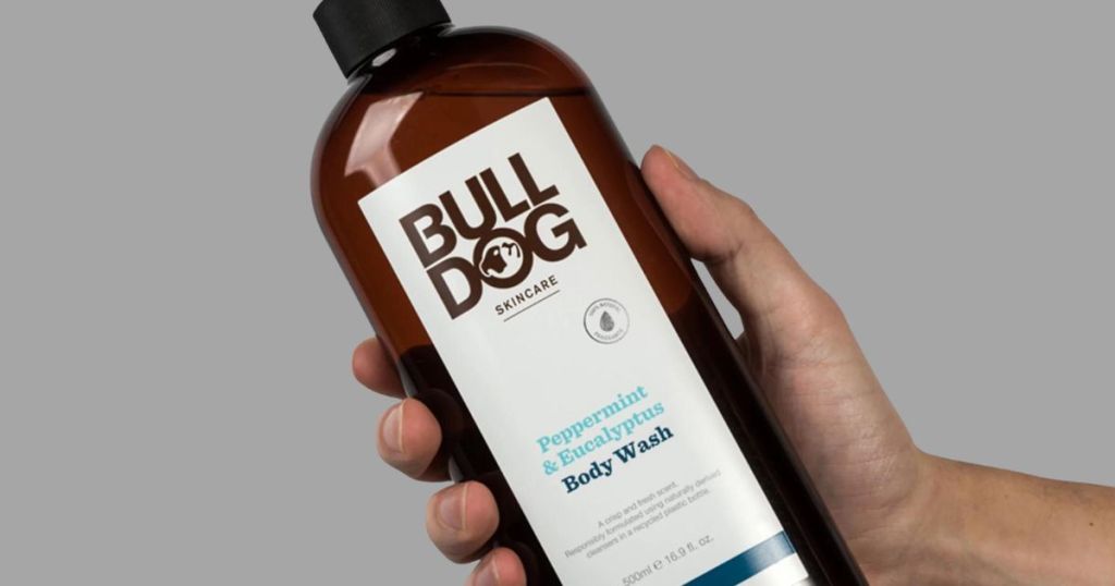 hand holding bottle of Bull Dog Body Wash 
