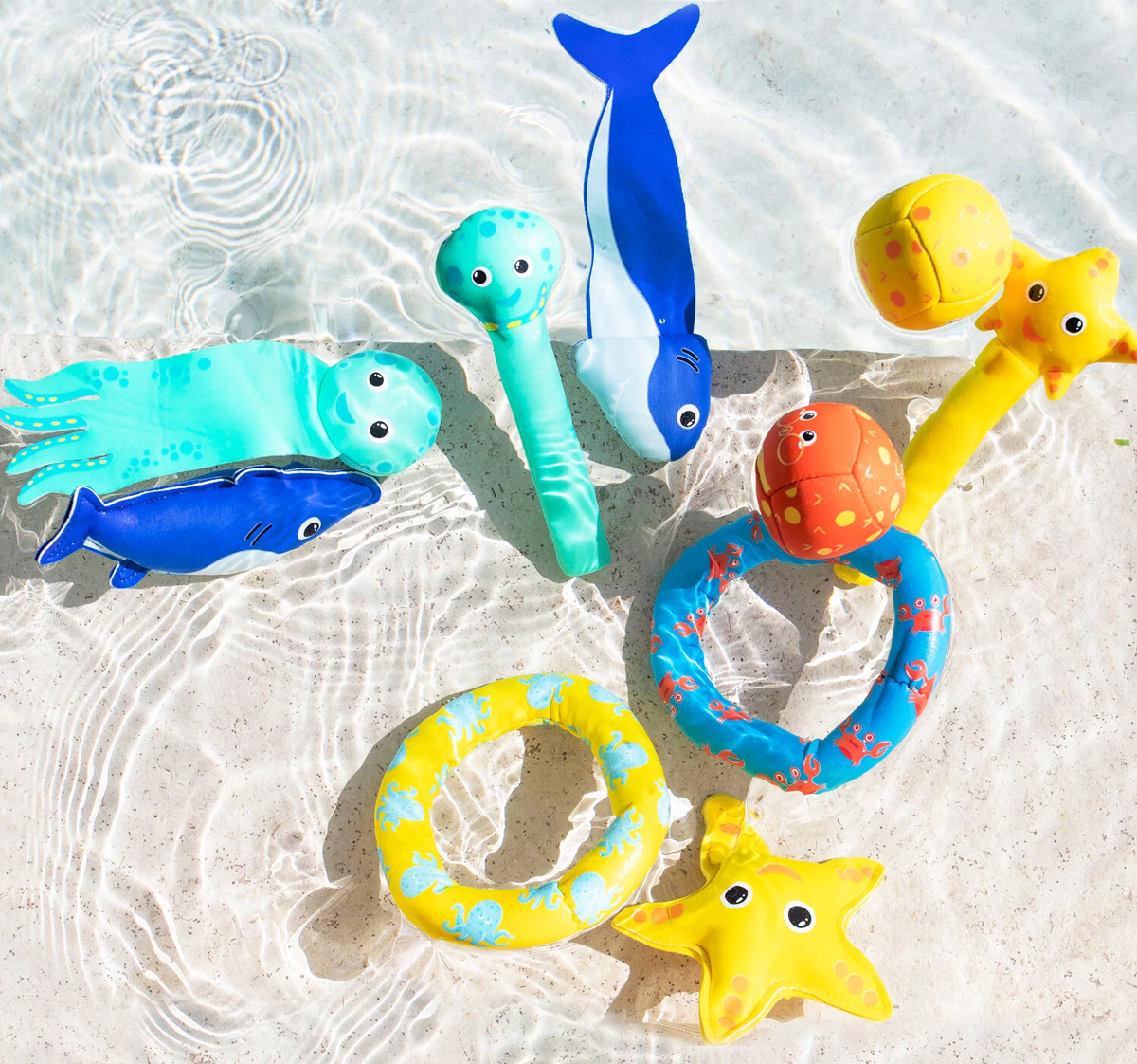 various water toys in water at beach