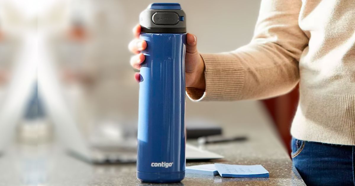 a womans hand grabbing a Contigo Cortland Chill 2.0 24-oz. Stainless Steel Water Bottle off a kitchen counter