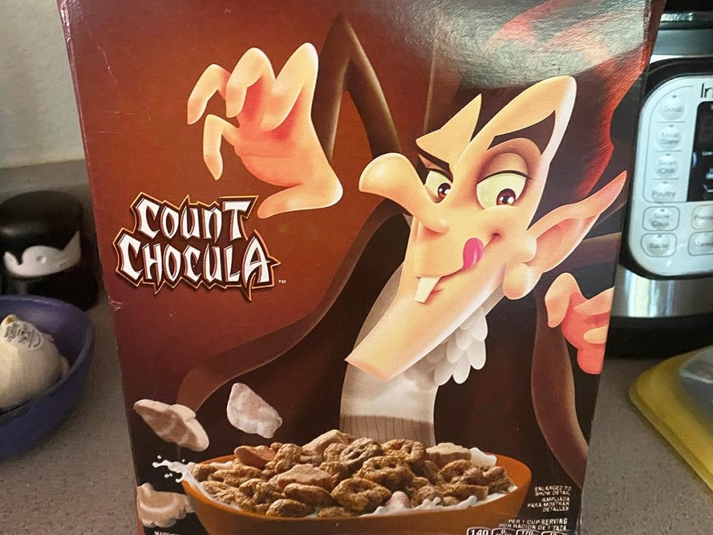 box of General Mills Count Chocula Cereal on kitchen counter