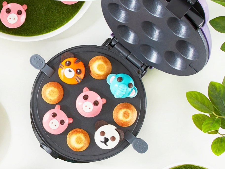 mini cupcake maker with frosted animal cupcakes inside