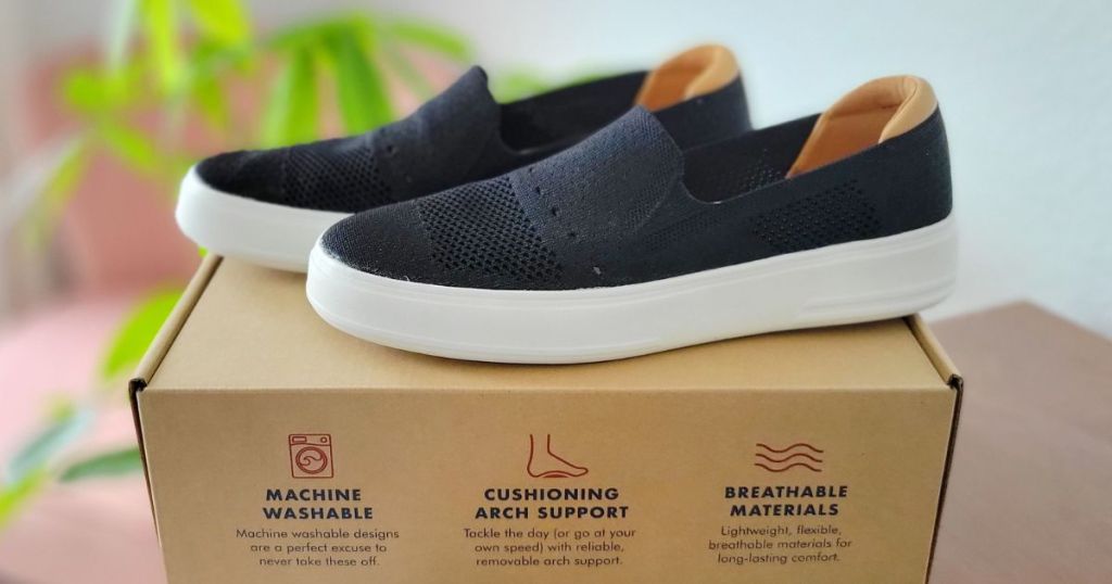 Dearfoams Sneakers on a shoebox