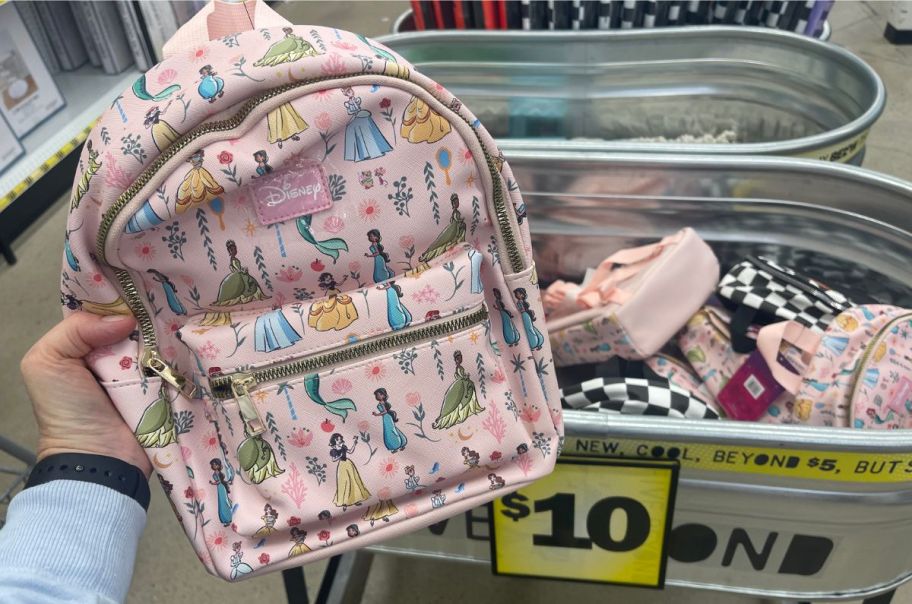 a womans a disney princess mini backpack