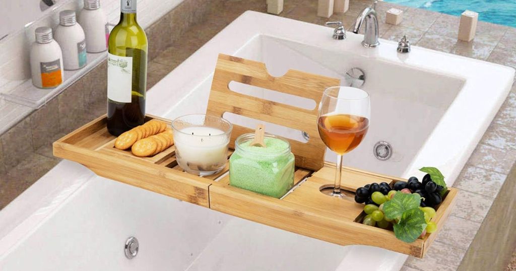 Extendable Bamboo Luxury Bath Caddy with bath, wine, wine glass, and snack