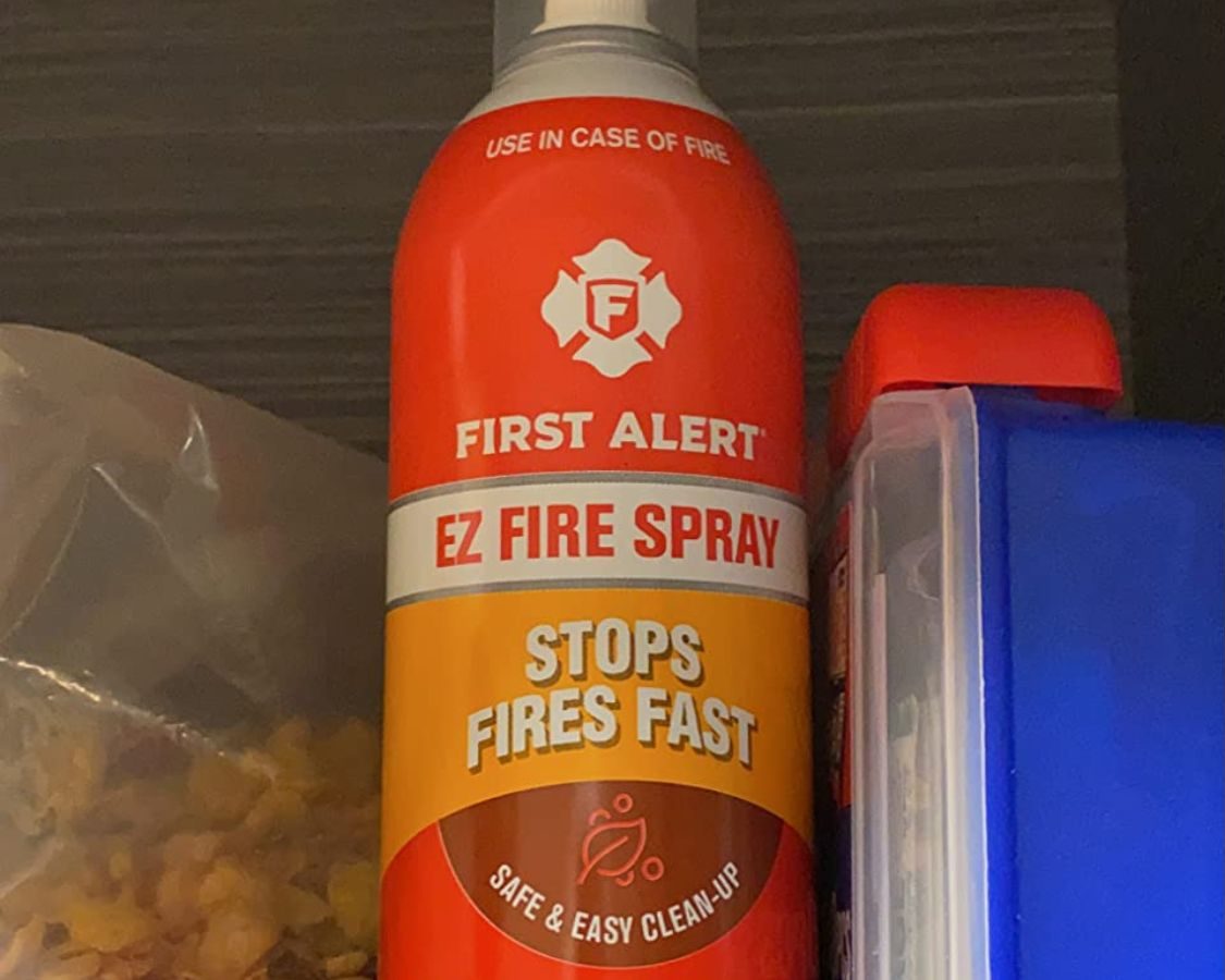 First Alert Fire Extinguisher Spray on a shelf in a home