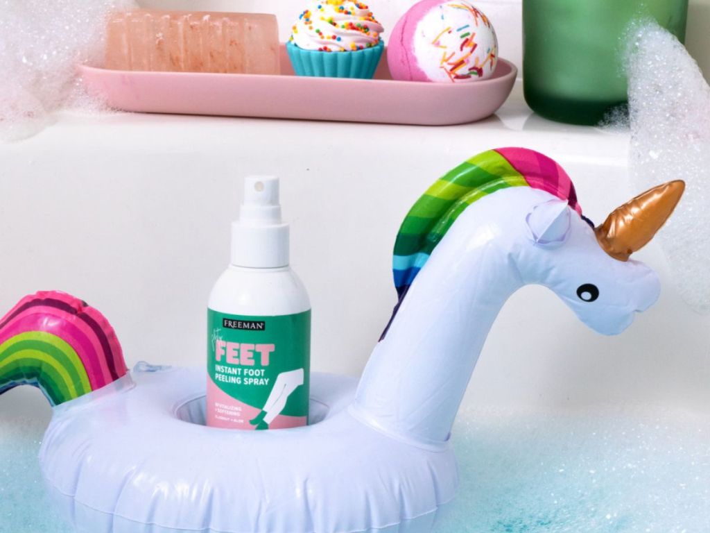 Freeman Foot Spray in a unicorn floar in the bathtub