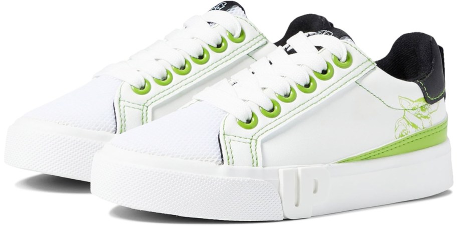 white and green sneakers with grogu on the side