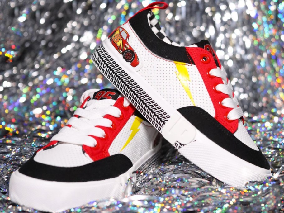 pair of black, white, and red disney car sneakers