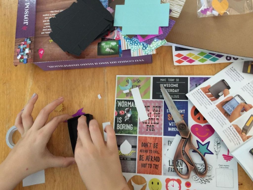Little kids hands working on a Craft-tastic – Inspire Poster Kit set