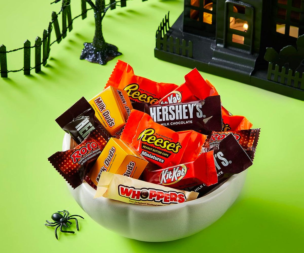 Hershey Halloween Candy Variety Bag displayed in a white bowl on lime green background