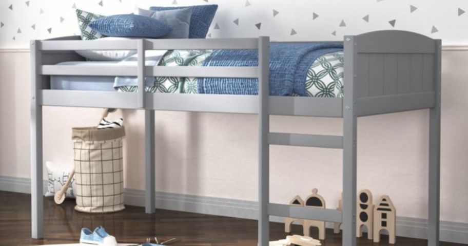 A Hillsdale Living Essentials Alexis Wood Arch Twin Jr. Loft Bed n a child's room