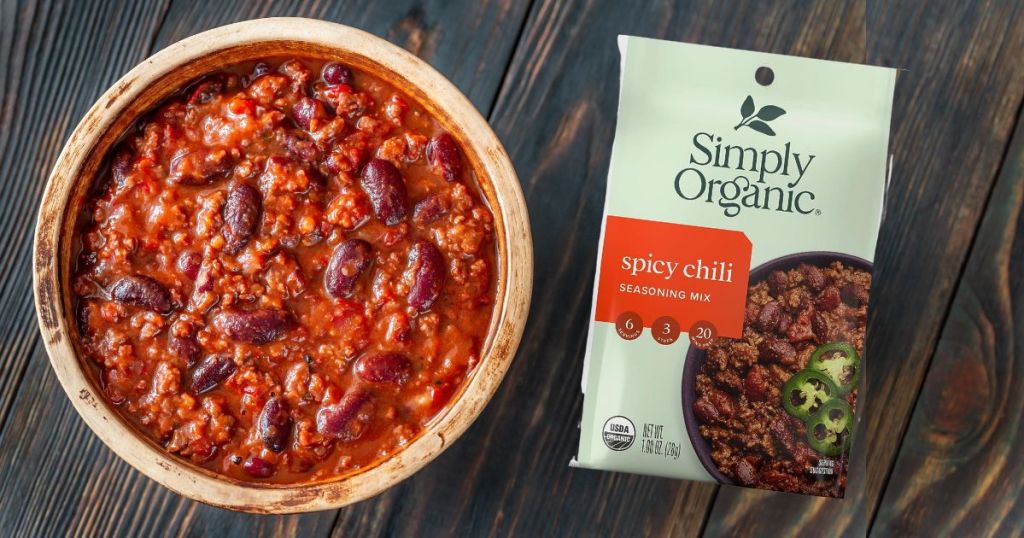 Simply Organic Spicy Chili Seasoning packet shown with bowl of chili
