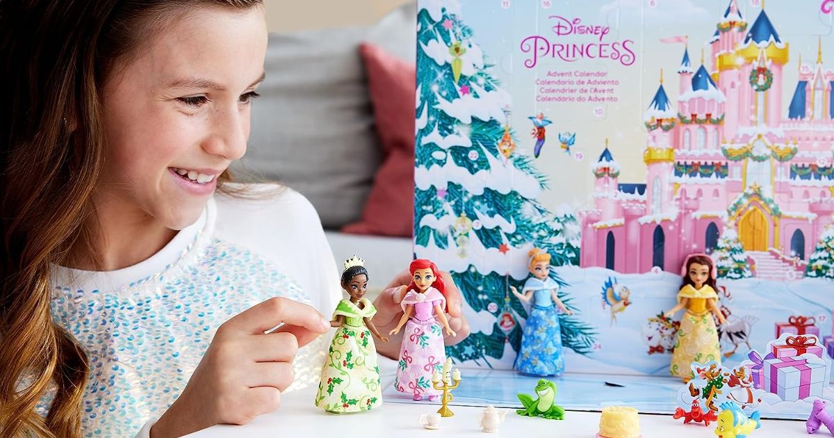 Little Girl Playing with a Disney Princess Advent Calendar