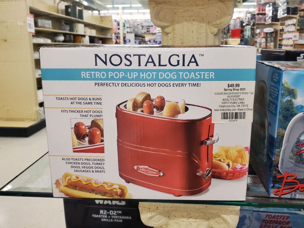 Nostalgia Retro Pop-Up Hot Dog Toaster on display in store