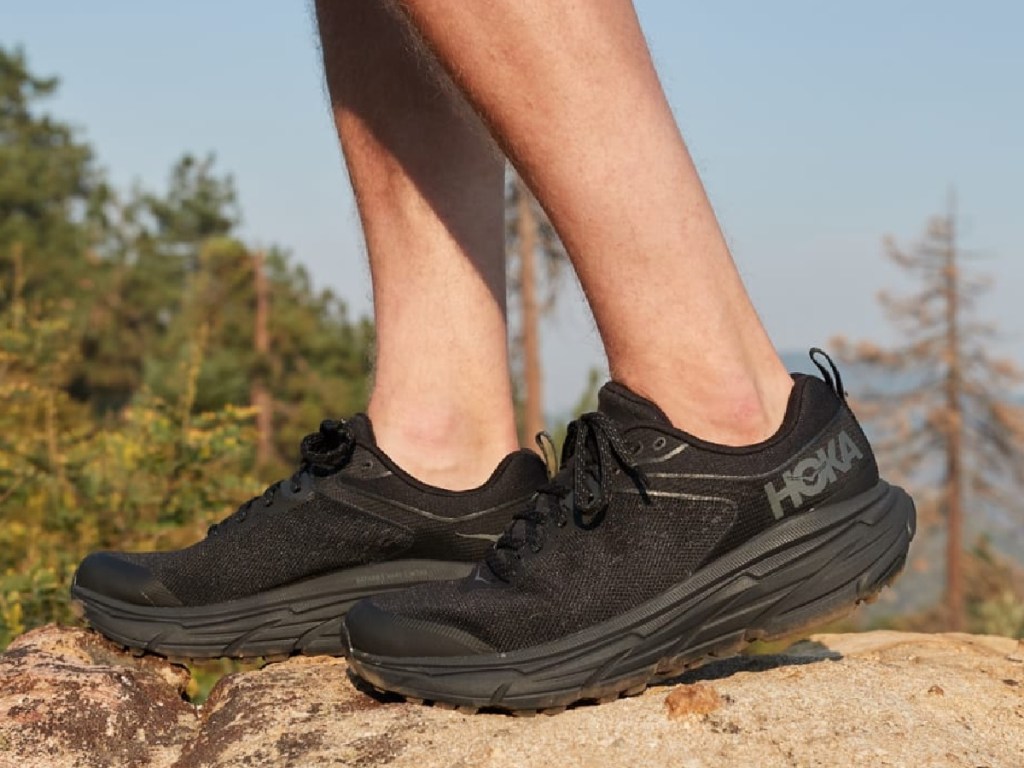 man wearing black Hoka Challenger ATR 6 Trail Running Shoes