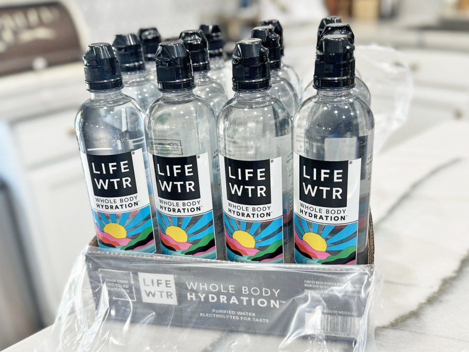 12-pack case of LIFEWTR bottles on kitchen counter