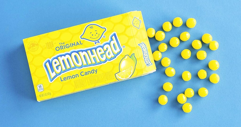 box of lemonhead candy with candies coming out