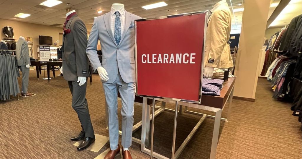 Mannequin next to a clearance sign at Men's Wearhouse