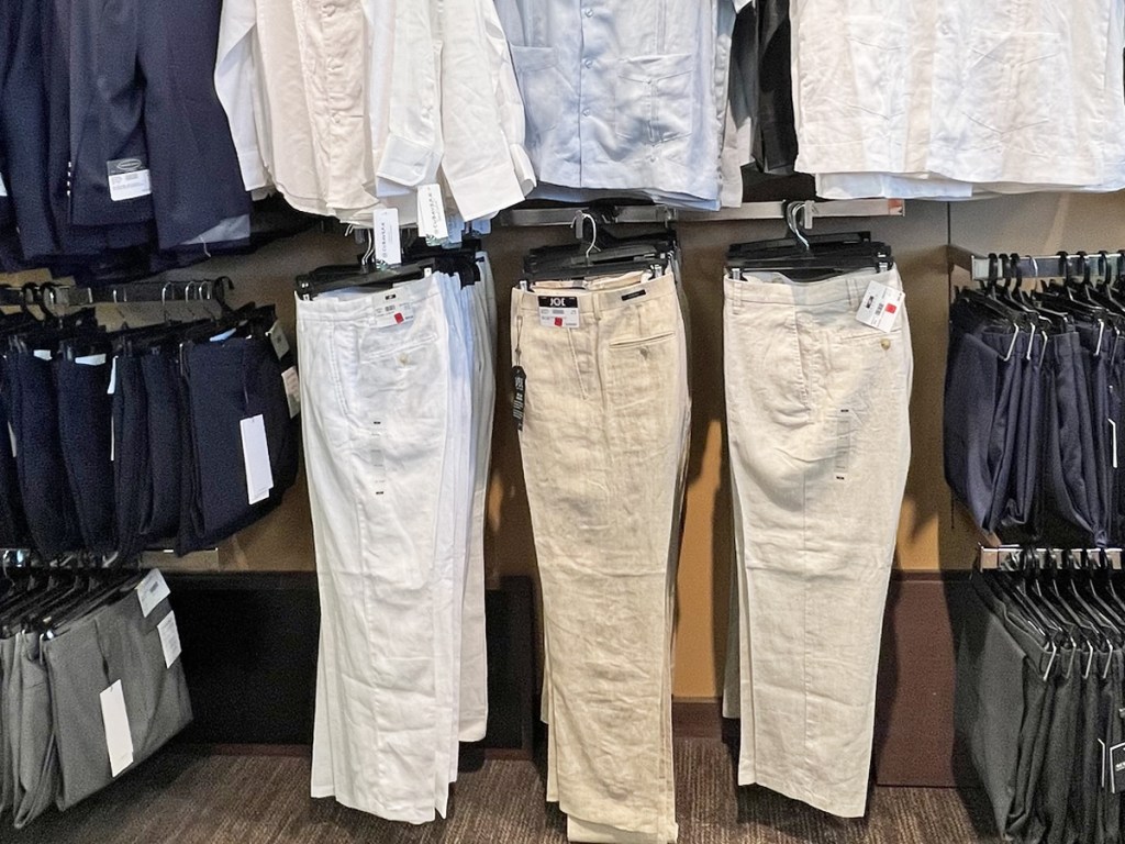 men's pants on store display racks
