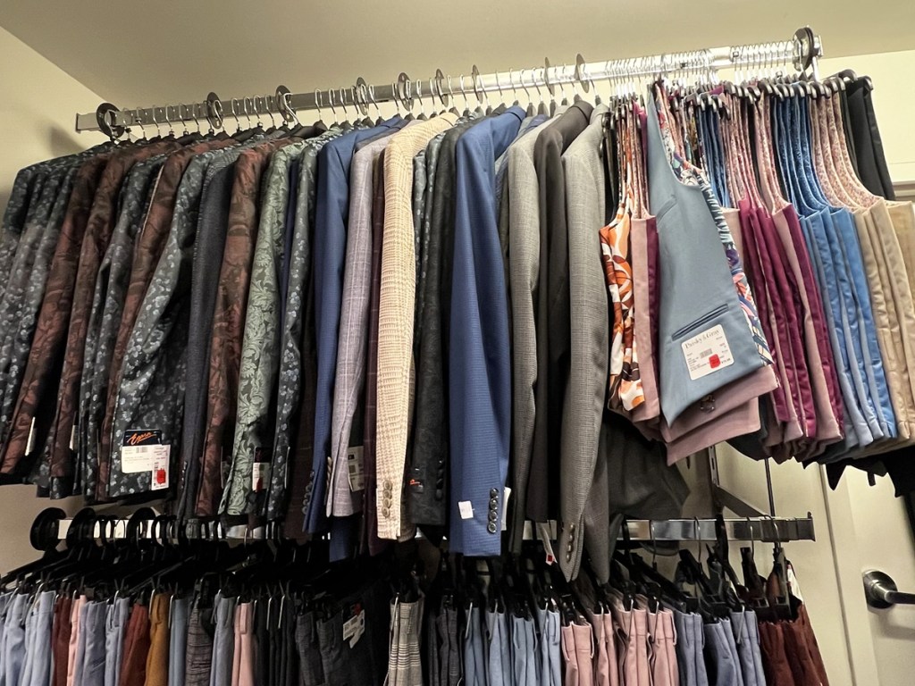 sport coats and vests on store display rack