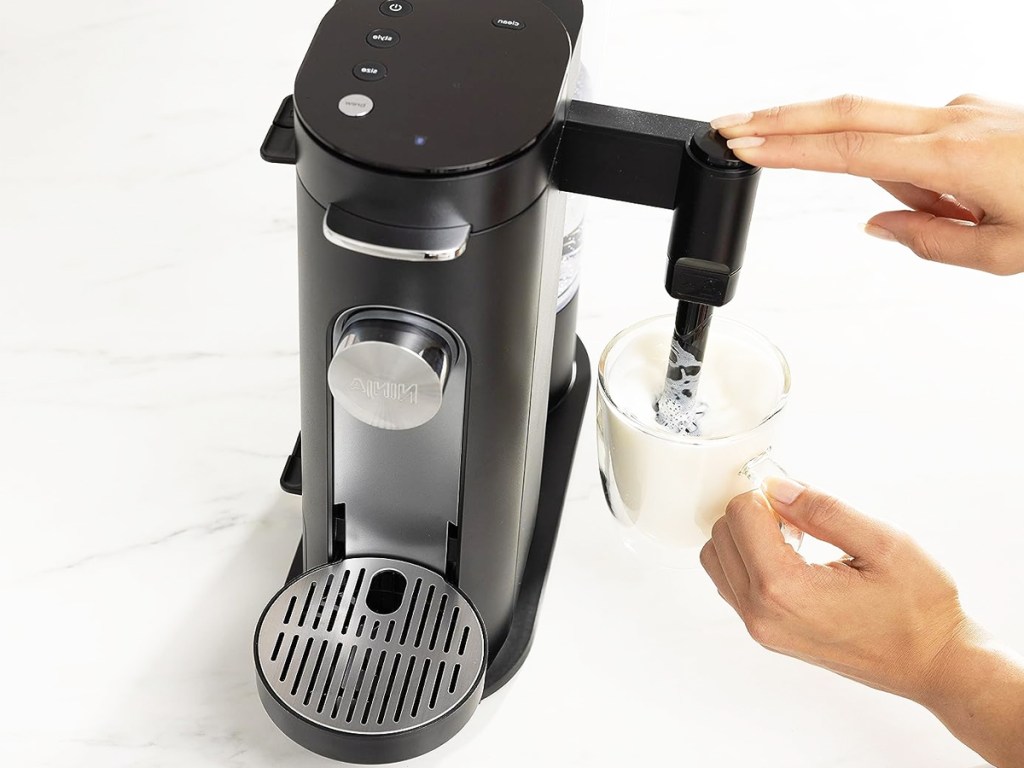 frothing a cup of milk with a ninja coffee maker
