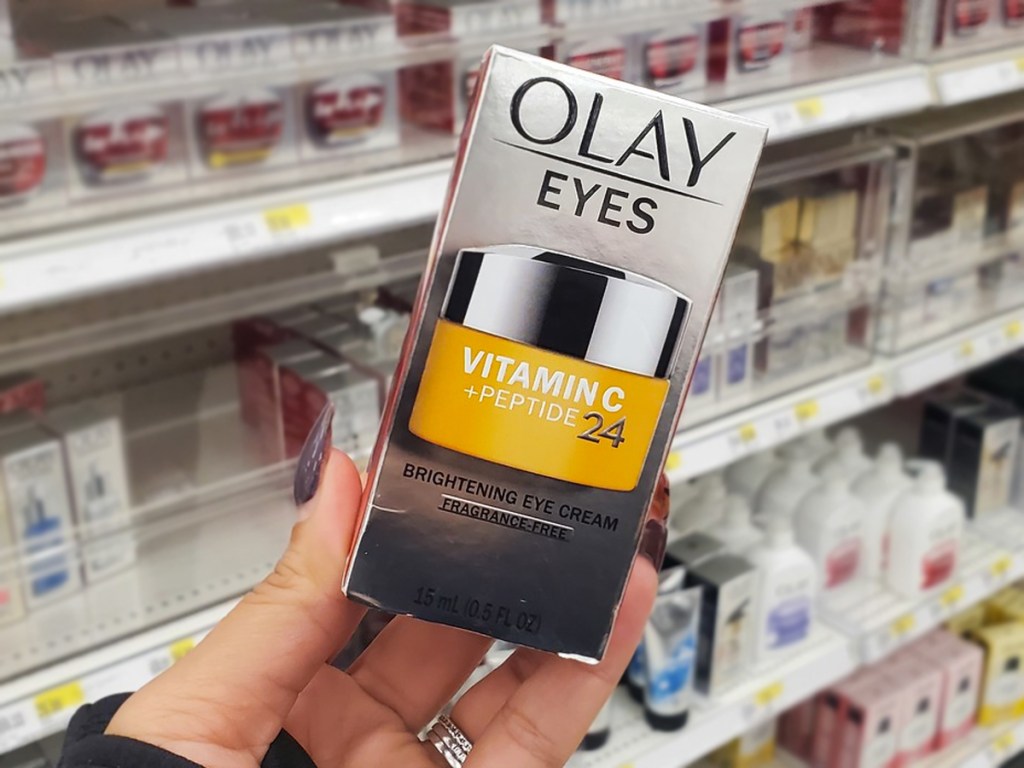 hand holding olay vitamin c eye cream box