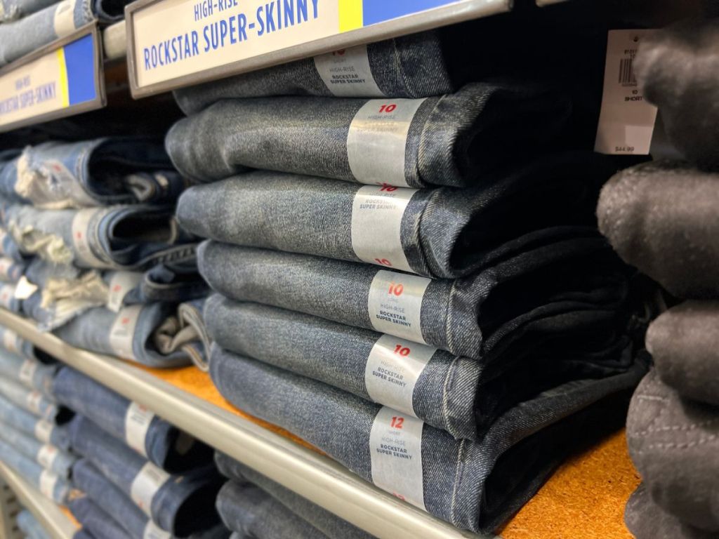 A pile of folded Old navy rockstar jeans for women