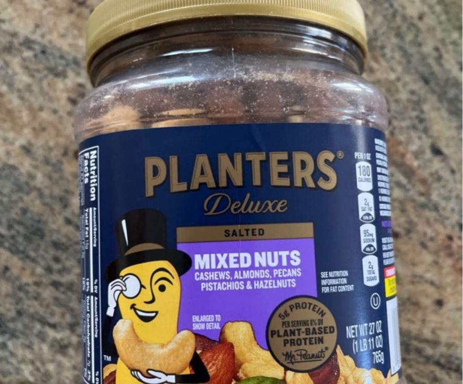 planters mixed nuts container laying on countertop