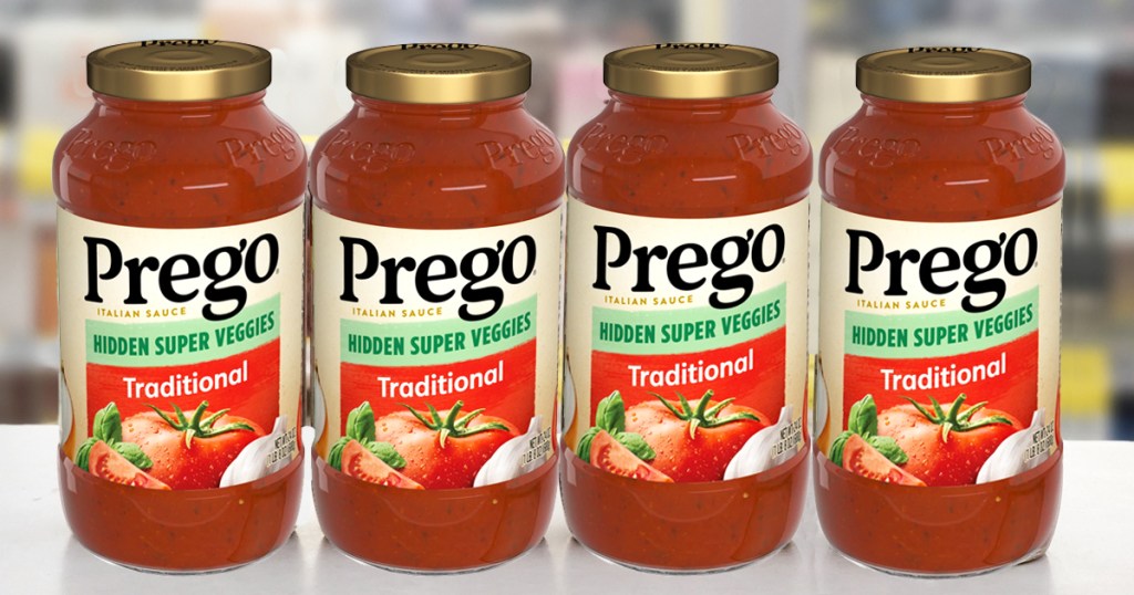four prego pasta sauce jars on table