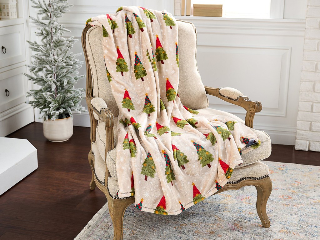 QVC throw blankets displayed on chair
