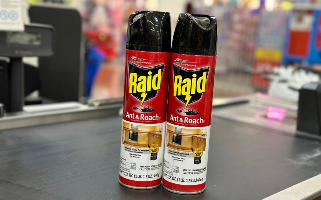 2 cans of raid ant and roach spray