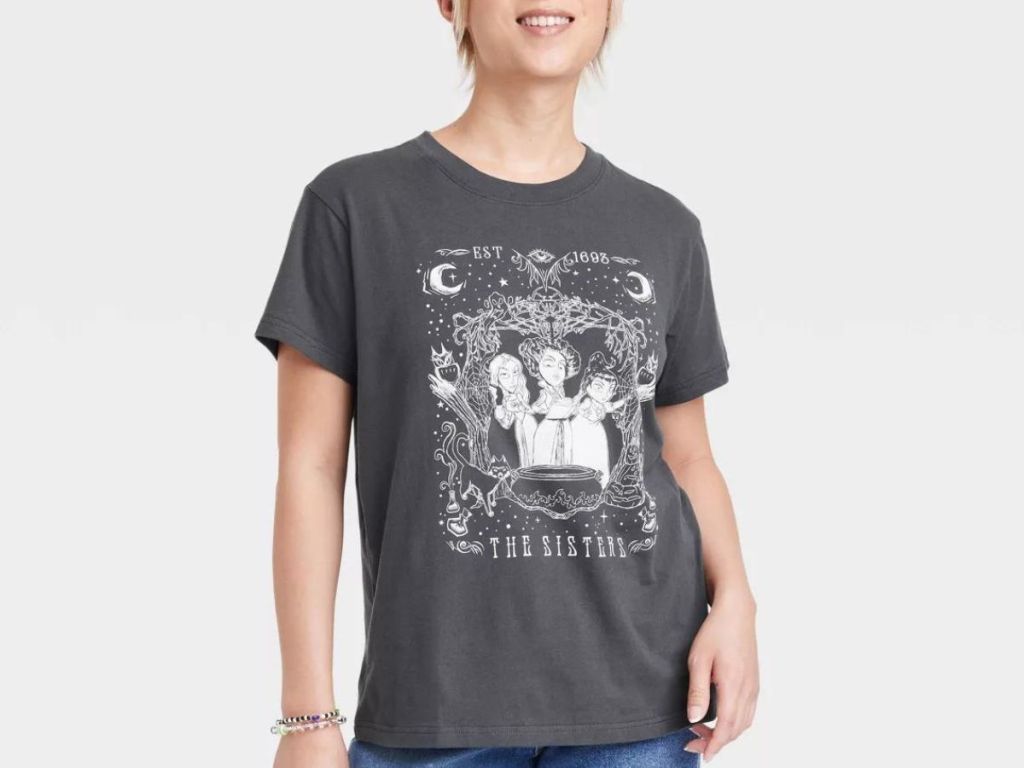 Woman wearing a Hocus Pocus Graphic Tee from Target