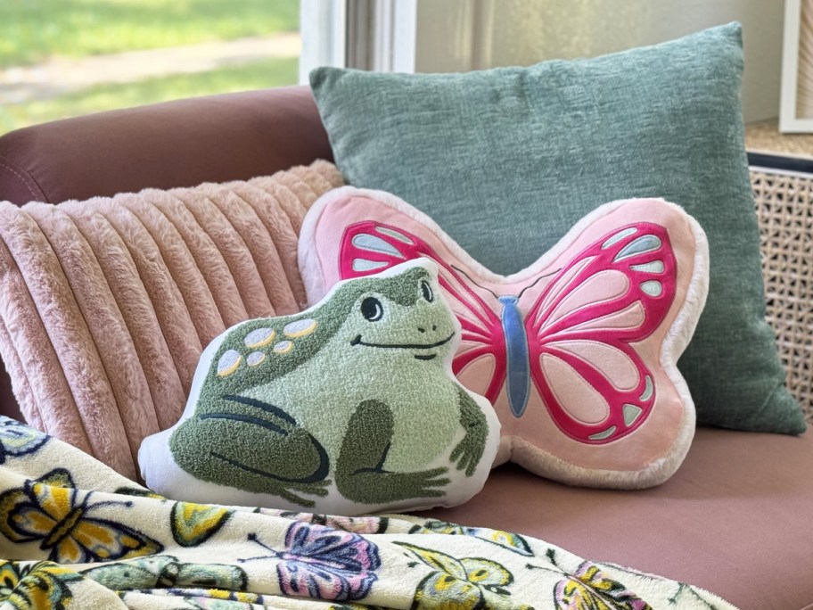 frog and butterfly shaped throw pillows