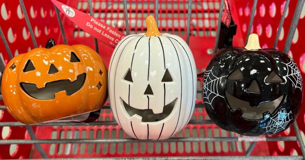 3 Ceramic pumpkins from the Bullseye Section of target in the front of a shopping cart