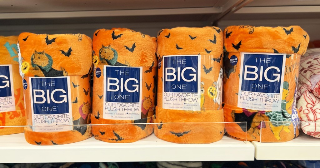 orange halloween throw blankets on store shelf